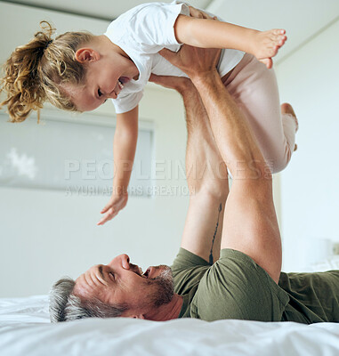 Buy stock photo Family, dad and lifting daughter on bed while having fun and enjoying time together bonding during airplane game family activity. Playing, support and laughing man and girl child in bedroom at home