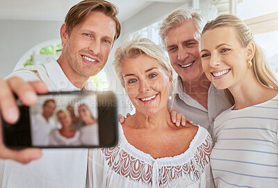 Buy stock photo Selfie, family and phone with a mobile in the hand of a man with his senior parents in a home for a visit. Happy, smile and love with elderly pensioner parents and their adult children taking a photo