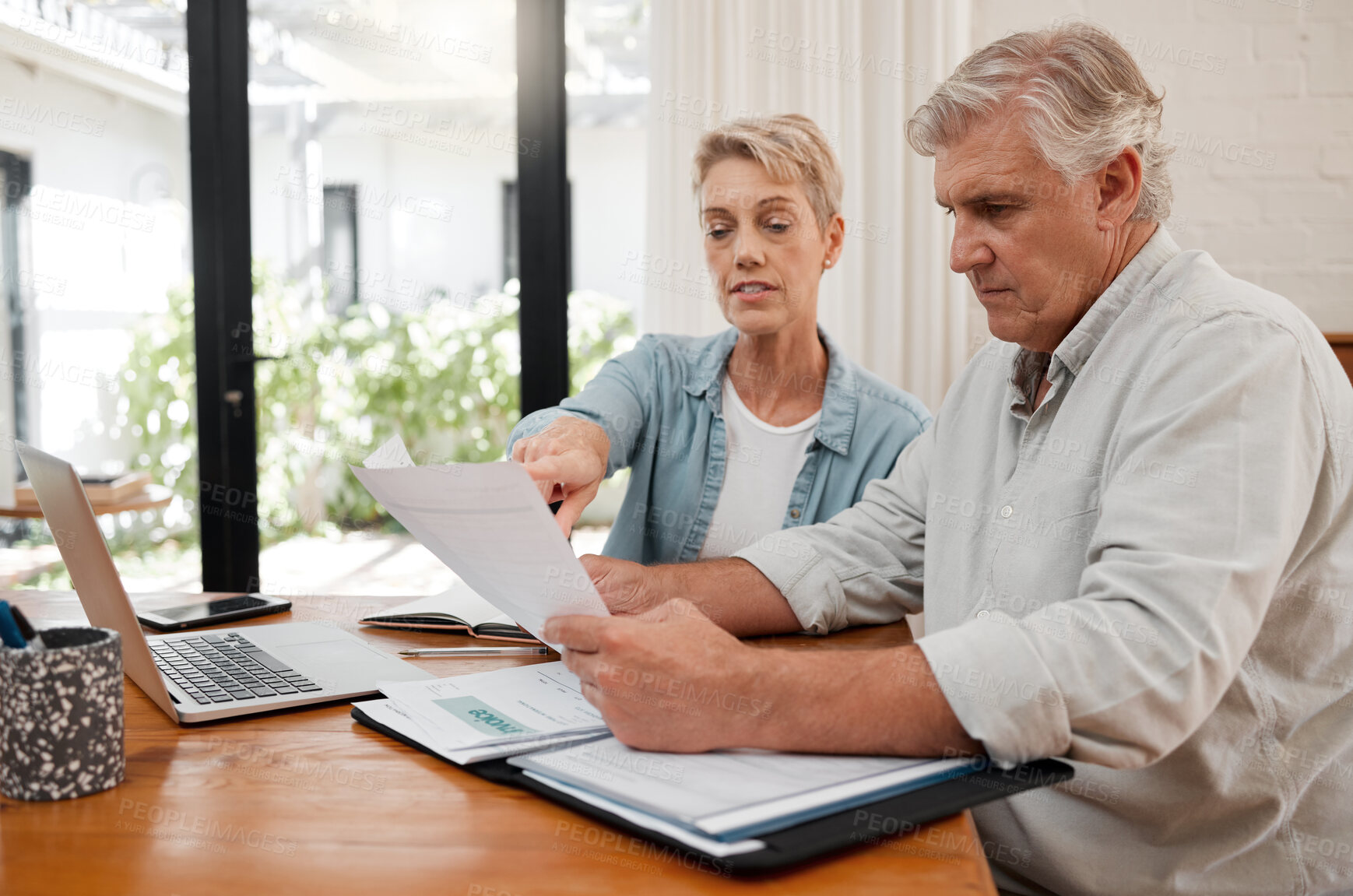 Buy stock photo Retirement couple budget, finance and investment planning, loan and paper bills for online banking at home. Senior man, woman and people reading tax money report, cash savings and admin document note
