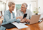 Phone, finance and retirement with a senior man and woman working on their will, savings and investment together in a home. Money, communication and documents with an eldery male and female pensioner