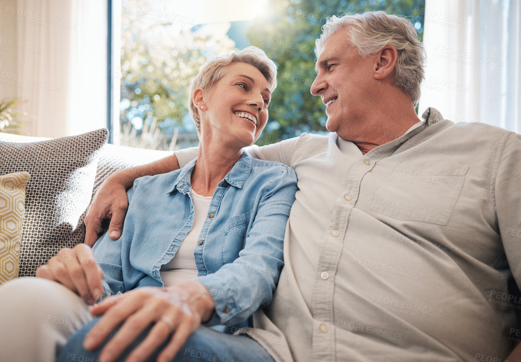 Buy stock photo Retirement, relax and love with couple on sofa for happy, support and health wellness at home together. Marriage, care and freedom with elderly man and old woman sitting on couch in living room