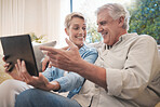 Tablet, love and couple with a senior woman and man online for social media, video call or watching series and movies. Happy, smile and fun with an elderyl male and female pensioner in a living room