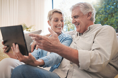 Buy stock photo Tablet, love and senior couple with woman and man online for social media, video call or watching series and movies. Happy, smile and fun with an elderly male and female pensioner in a living room