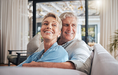 Buy stock photo Love, couple and retirement with a senior woman and man on a sofa to relax in their home together. Happy, smile and thinking with an elderly male and female pensioner in the living room of a house