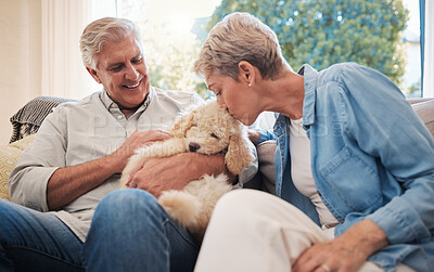 Buy stock photo Love, relax and retirement couple with dog pet on living room sofa together in house. Senior, happy and married caucasian people enjoy bonding with an animal companion in family home.

