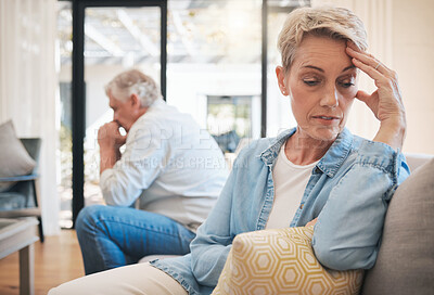Buy stock photo Mature couple, stress or divorce fight in house living room or home interior sofa. Angry, sad or depression woman face with anxiety in cheating affair argument with man in marriage therapy counseling
