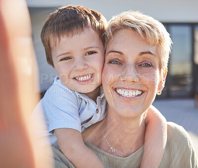 Buy stock photo Selfie, grandma and child love to smile, play and bond together outdoor at family home or house. Happy senior, elderly or grandparent with young kid smiling for joy, happiness and care outside    