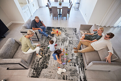 Buy stock photo Big family in living room home with parents, baby or children play on carpet for growth, development and wellness. Overhead grandmother and grandfather talking to kids for language learning in lounge