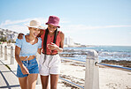 Summer, friends and beach with happy and laughing black women walking and bonding along the ocean. Freedom, relax and weekend fun by girls discussing funny joke and enjoy free time outdoors together