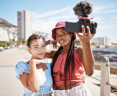 Buy stock photo Live streaming holiday, beach travel and friends working on video podcast on international vacation in Miami, selfie with camera and summer content. African influencer women talking photo by the sea