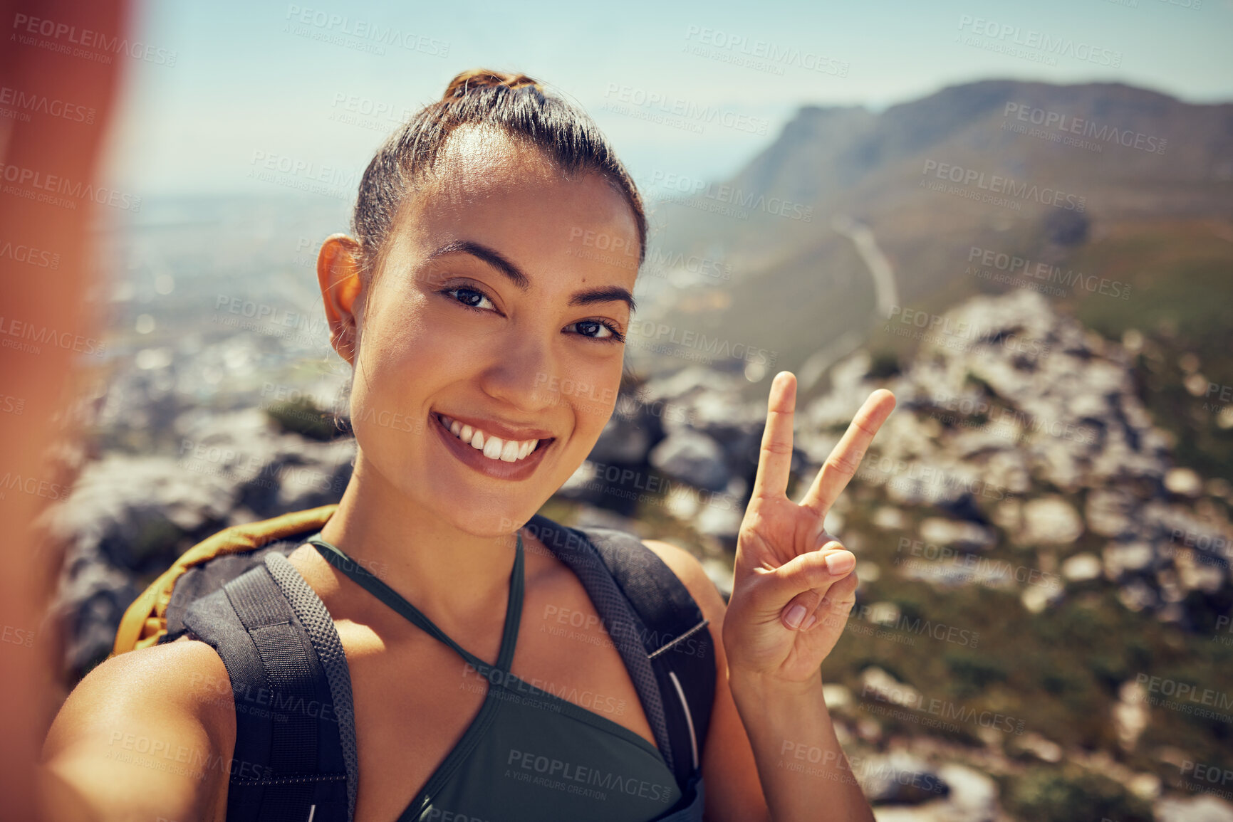 Buy stock photo Hiking selfie, happy woman and fitness in nature on a mountain for exercise, travel and trekking adventure during summer. Face, smile and peace sign female tourist exploring outdoors with a backpack