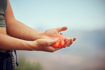 Buy stock photo Hand injury, pain or accident of woman hiking outdoor on mountain for fitness and exercise. Closeup of injured or swollen muscle of girl athlete trekking in nature in need of emergency medical help.