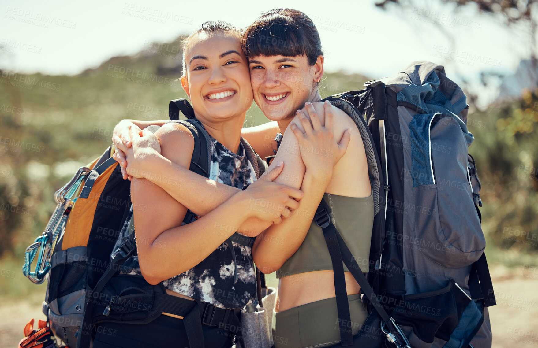Buy stock photo Women mountain hiking, friends hug in nature and outside in summer sun freedom. An adventure hike is great for exercise, fitness training and cardio with friend on hills of a local natural landscape 