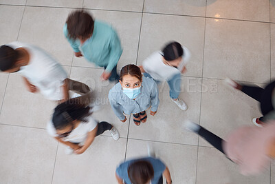 Buy stock photo Covid, crowd and woman with face mask scared, fear and anxiety of coronavirus, disease and infection from above. Panic, danger and social distance in public with people walking inside spreading virus