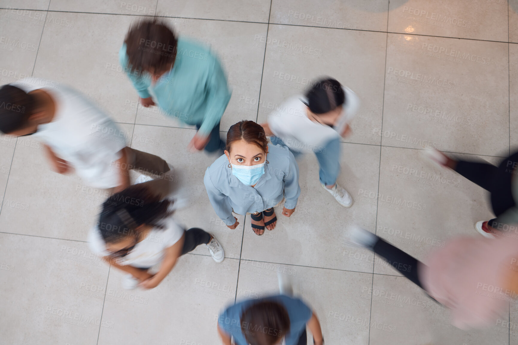 Buy stock photo Covid, crowd and woman with face mask scared, fear and anxiety of coronavirus, disease and infection from above. Panic, danger and social distance in public with people walking inside spreading virus