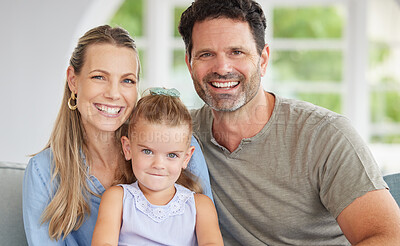 Buy stock photo Happy portrait, family love and girl relax with mother and father on the living room sofa of house, smile for happiness in home and together in lounge. Face of parents with care for child on couch