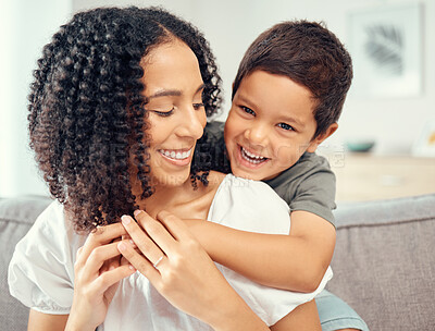 Buy stock photo Happy kid hug mom for mothers day, love and care while relaxing together on sofa lounge at home. Boy child playing with smile parent for happiness while bonding, enjoying quality time and fun 
