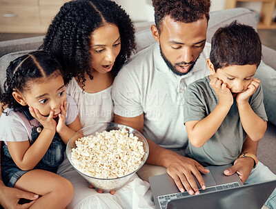 Buy stock photo Family time, laptop and popcorn while watching a movie, streaming cartoons and looking shocked, surprised and scared. Wifi connection, online tv and bonding with kids, man and woman on couch at home