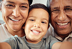 Boy take selfie with happy grandparents, together in closeup or zoom portrait in house. Latino male child smile with grandma and grandpa in macro with expression of happiness and love in family home