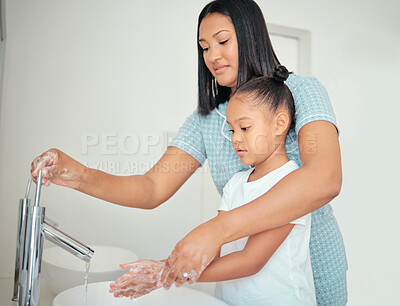 Buy stock photo Mom help, teaching girl to washing hands or cleaning with water for health, wellness safety or hygiene healthy lifestyle. Learning, mother and child wash hand with soap or bacteria protection