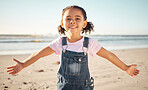Beach, happy girl child and portrait on holiday, vacation or summer trip outdoors. Carefree, smile and happiness of fun kid in Mexico ocean, sea and sandy shore travel location, earth and blue sky.