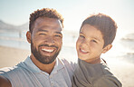 Happy, father and son smile in beach fun, vacation and break in summer happiness together. Portrait of dad and child selfie smiling in fun outdoor bonding free time on a sunny day at the ocean