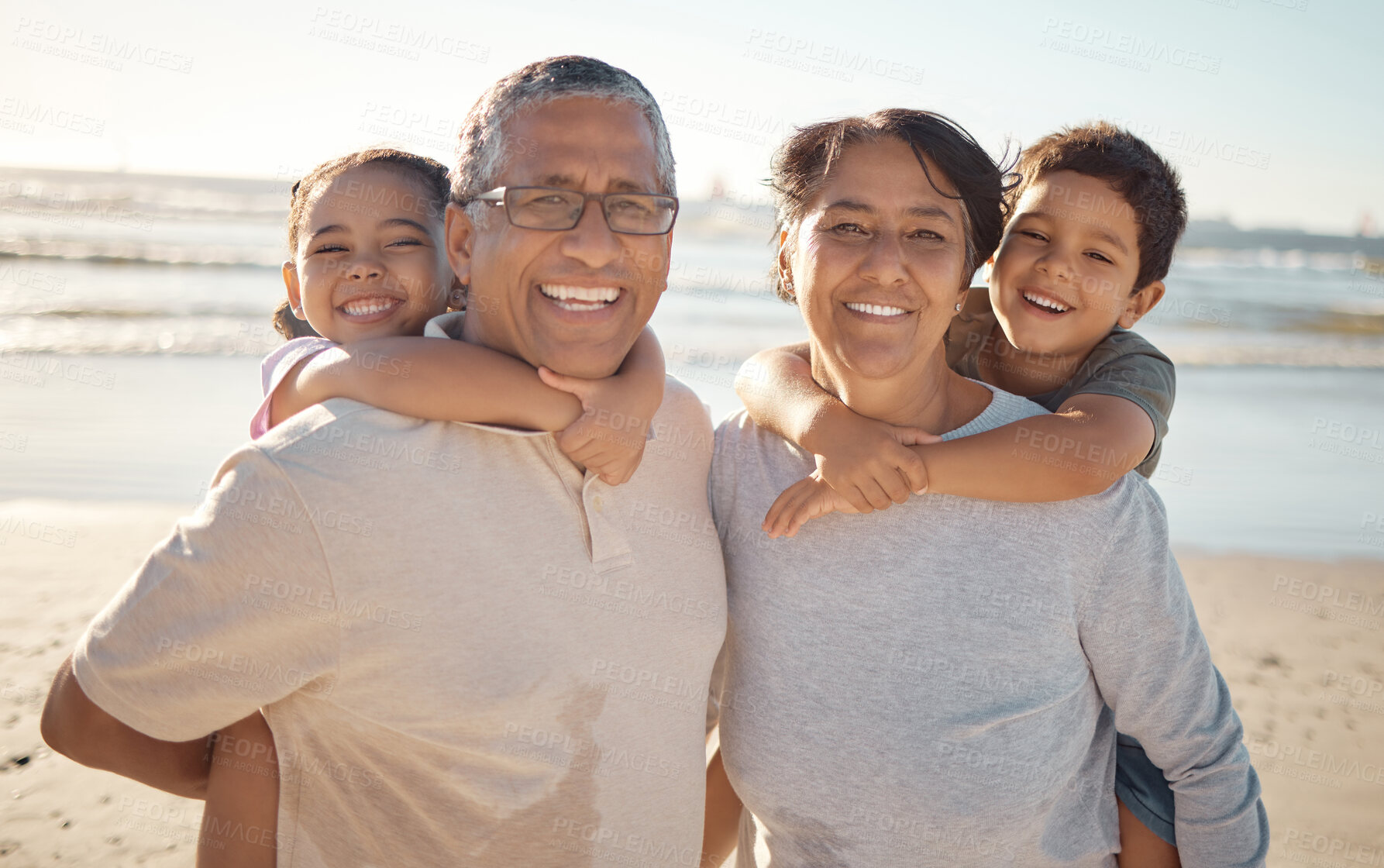 Buy stock photo Family on beach with grandparents and kids for summer or holiday, senior wellness and growth development. Young happy kids with grandmother and grandfather with sunshine, ocean for outdoor fun