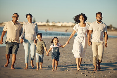 Buy stock photo Family on beach with children smile while parents, kids grandparents holding hands on vacation by the ocean. Black family walking in sand by the sea, show love and bonding on holiday or reunion