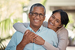 Portrait of an elderly couple hugging and bonding outdoors, happy and relaxing in a yard or garden together. Senior man and woman enjoying retirement and a peaceful morning on a patio at home