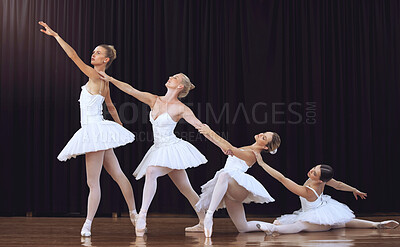Buy stock photo Ballet, dancing and group stage performance at an art theatre with creative movement. Dancers, flexible and young women ballerinas dance elegantly together performing swan lake play in costumes 
