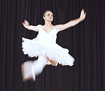 Ballet woman dancer, dancing does dance jump in air during cretaive stage performance. Professional ballerina working on training balance, fitness and energy for a theatre production or opera concert