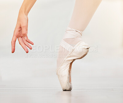 Buy stock photo Closeup of dancer foot on floor, ballet shoe and hand, show posture and balance at dance class. Zoom of woman dancing in studio to practice or stage, during profession performance or recital