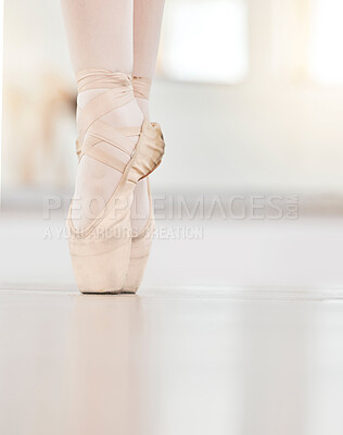 Buy stock photo Zoom of dancer feet on floor, ballet shoe and tip of toes, show posture and balance at dance practice. Closeup of girl dancing in studio training, in professional performance or recital in Ukraine