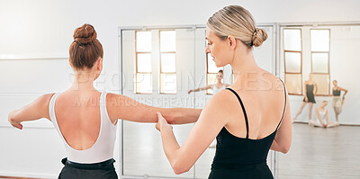 Buy stock photo Ballet, dance and learning with a woman teacher and student dancer dancing and training in a performance studio. Fitness, education and exercise with a female ballerina and her instructor by a mirror