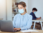 Laptop, notebook and corporate employee with a face mask working on a project while sitting at desk. Professional woman typing a company documents on her computer in the office during global pandemic