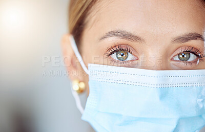 Buy stock photo Health, wellness and covid face mask of a young woman safety and head. Eye zoom of a female with nose and mouth cover for prevention and protection from coronavirus, flu and cold in a pandemic