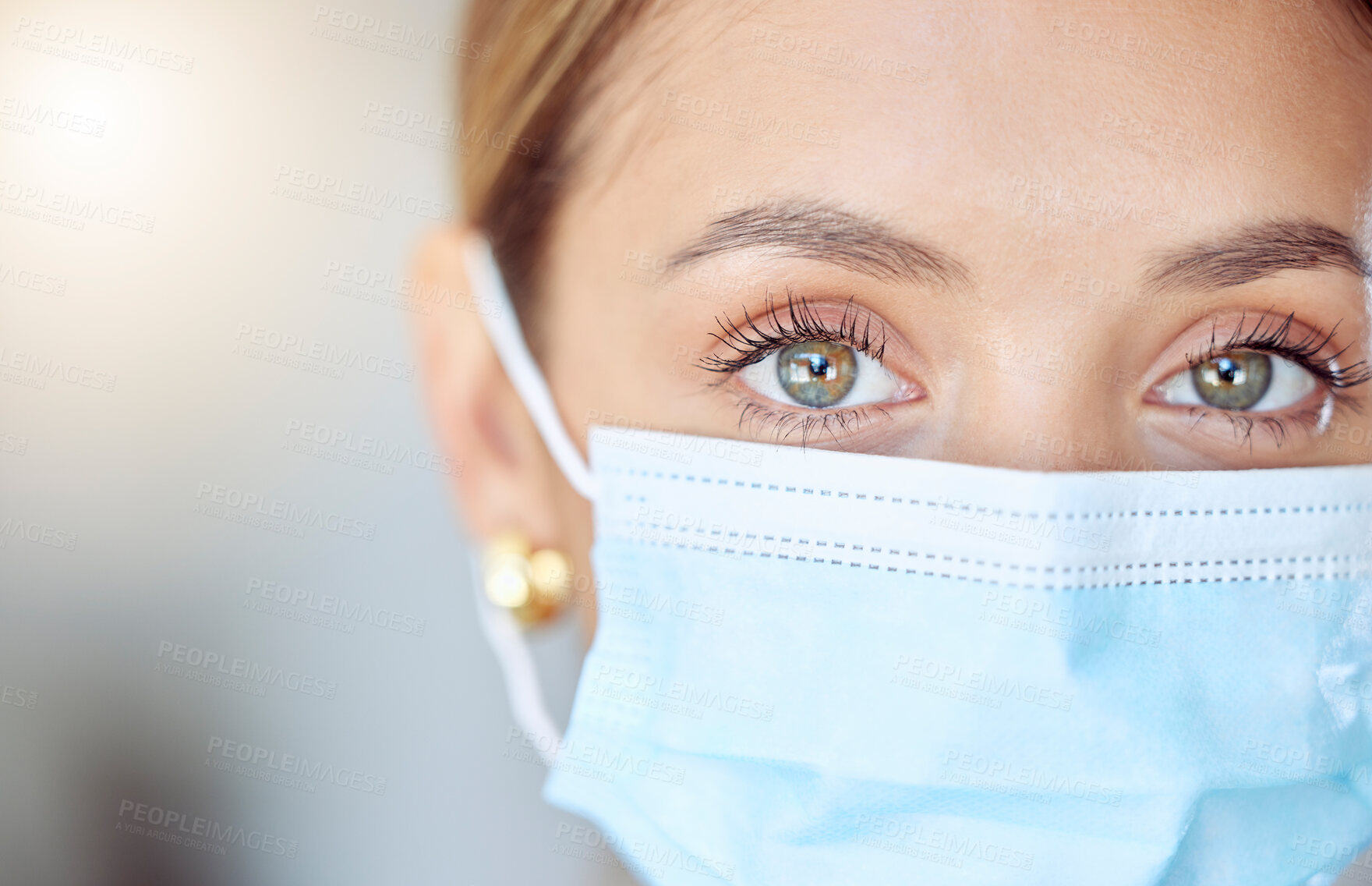 Buy stock photo Health, wellness and covid face mask of a young woman safety and head. Eye zoom of a female with nose and mouth cover for prevention and protection from coronavirus, flu and cold in a pandemic