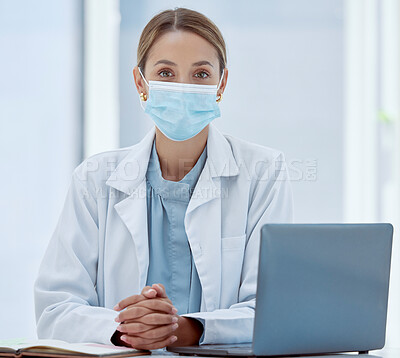 Buy stock photo Covid, laptop telehealth and doctor face mask for healthcare, safety and insurance in medical clinic. Portrait woman, wellness expert and therapist consulting online in corona virus pandemic hospital