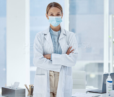 Buy stock photo Covid, face mask and woman doctor with trust, insurance help and protection to stop spread of global virus in hospital. Portrait, medical worker and healthcare employee in covid 19 safety compliance