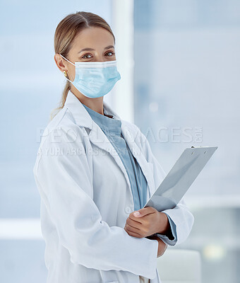 Buy stock photo Covid, woman doctor and face mask safety, medicine and risk in medical hospital, surgery and clinic. Portrait of corona virus clipboard research, healthcare expert and professional wellness therapist