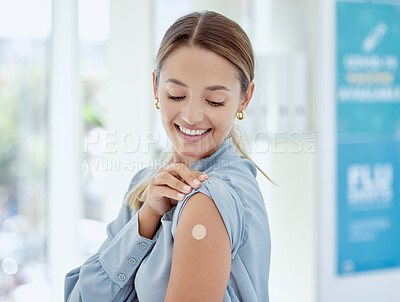 Buy stock photo Covid, vaccine and plaster with a healthcare woman in a hospital after getting a shot, booster or medical injection. Injection, immunity and medicine with a female getting vaccinated in a clinic