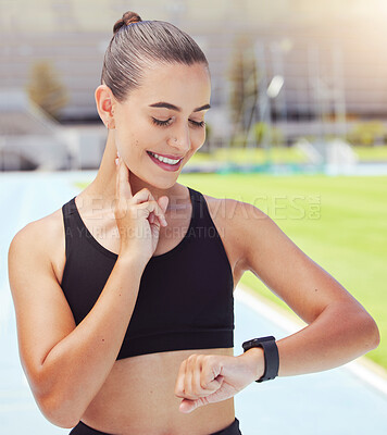 Buy stock photo Sport, watch and time with a sports woman training during a workout and checking or tracking her progress. Health, fitness and wellness with a young female athlete timing her performance on a run