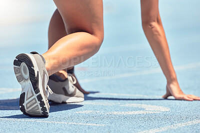 Buy stock photo Running, shoes and start with a sports woman or female runner on a track for a workout, exercise or training. Fitness, run and cardio with an athlete getting ready for a competition or race outside