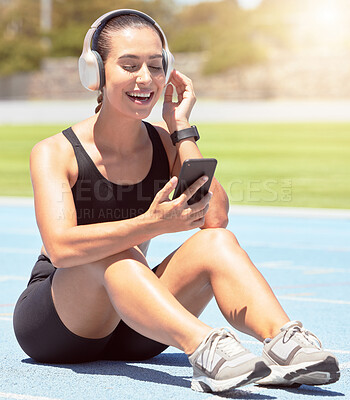 Buy stock photo Fitness, phone and exercise with woman listening to motivation training and wellness podcast during outdoor workout. Music, radio and relax by happy, smiling girl checking message before cardio run