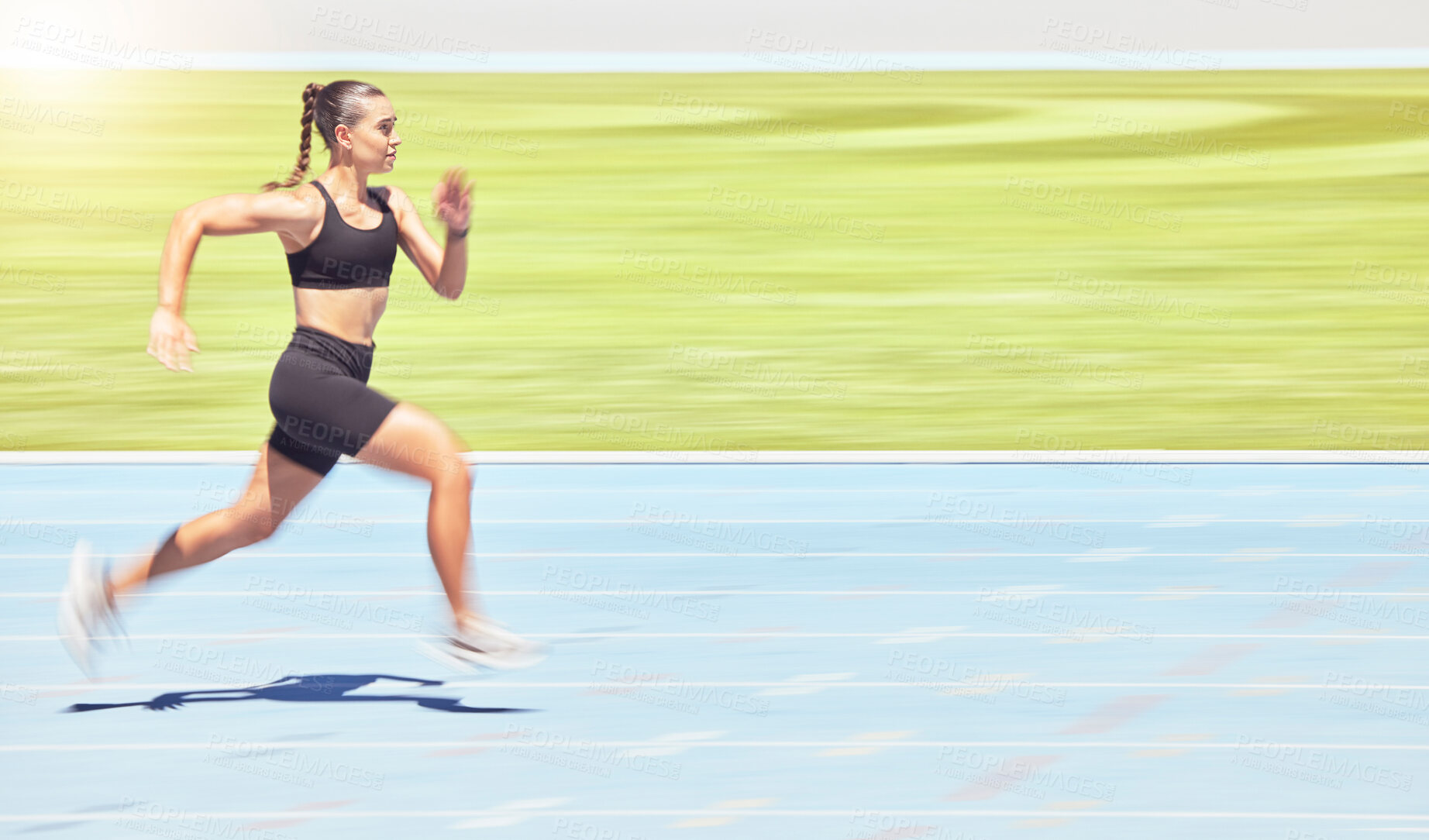 Buy stock photo Runner woman and marathon training on stadium track for athlete competition exercise commitment. Fitness, wellness and workout girl sprint and speed for athletic performance practice.

