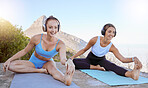 Yoga, women and stretching, relax and exercise outdoor workout or activity in the nature on yoga mats with headphone. Females smile, focus and training or palates together with mountain behind them. 