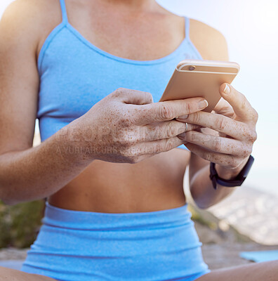 Buy stock photo Woman hands, fitness app and phone typing outdoor in workout videos, exercise tutorial and workout music playlist. Closeup yoga girl reading social media, mobile notification and online virtual coach