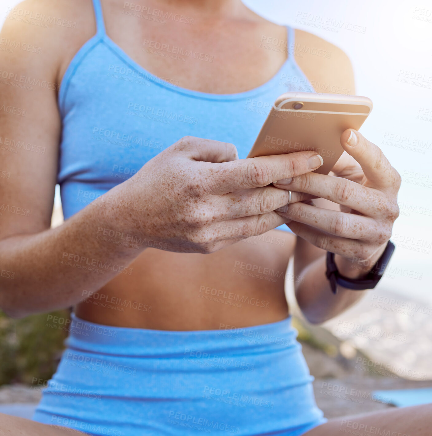 Buy stock photo Woman hands, fitness app and phone typing outdoor in workout videos, exercise tutorial and workout music playlist. Closeup yoga girl reading social media, mobile notification and online virtual coach