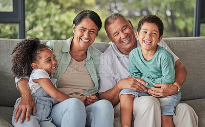 Buy stock photo Love, happy family and children bonding with grandparents on sofa at home, laugh and having fun in their family home.  Relax, play and excited kids embracing and enjoying a visit to grandparent home