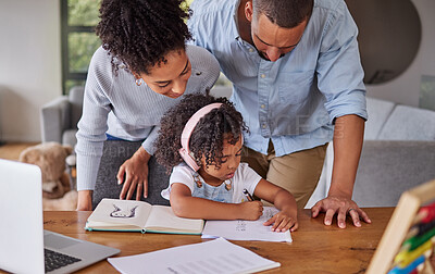 Buy stock photo Learning, education and homework with a family writing, drawing and studying together on a table at home. Parents and girl with headphone and learn together while teaching happy and knowledge
